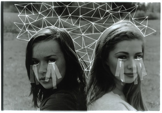 Katrina and Olivia sitting in a fields - dark room edits