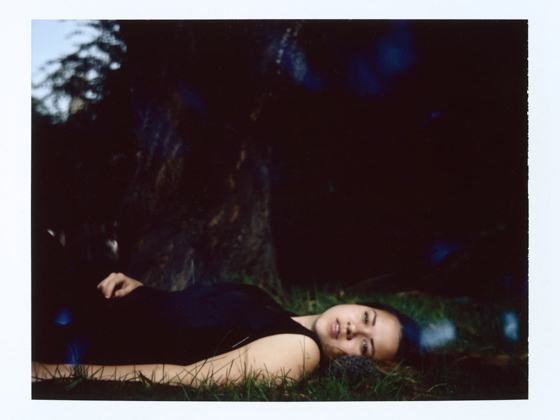 Polaroid self portrait of me laying in the grass